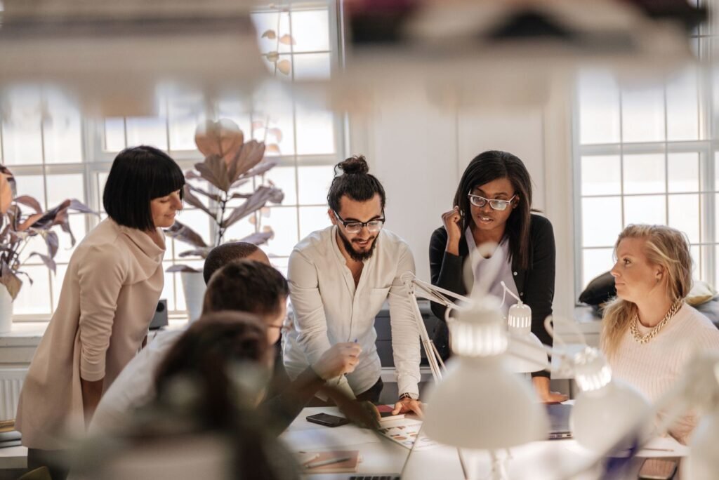 Expert team collaborating, meticulously analyzing website data to uncover issues during an SEO audit.