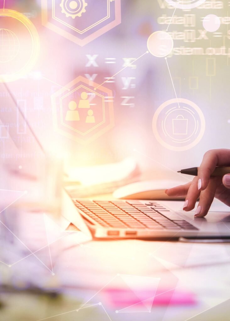 Close-up of a hand on a laptop trackpad, surrounded by glowing digital icons for programmatic ad targeting and optimization.