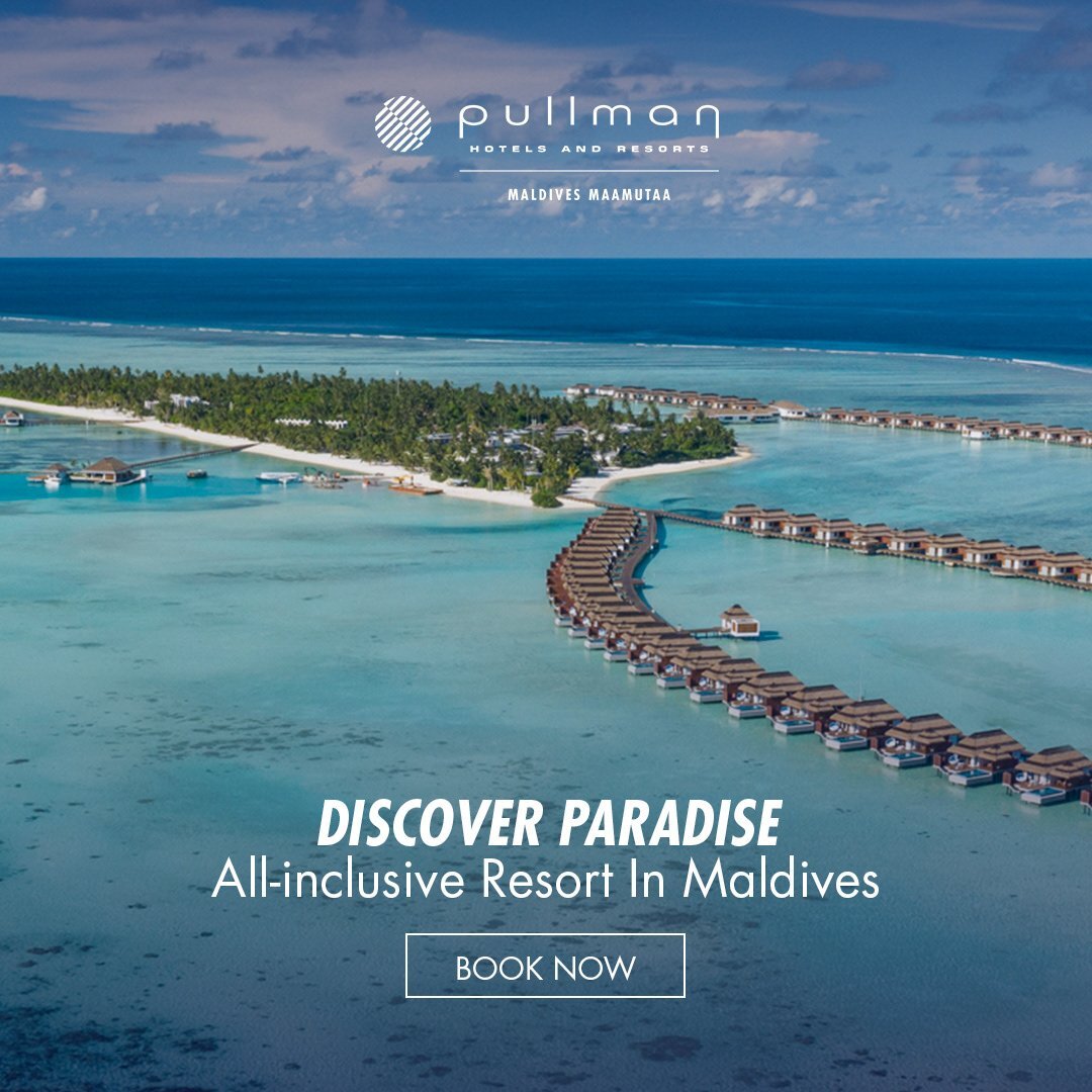Aerial view of Pullman Maldives Maamutaa luxury overwater resort, showcasing hospitality excellence with bungalows over turquoise water.